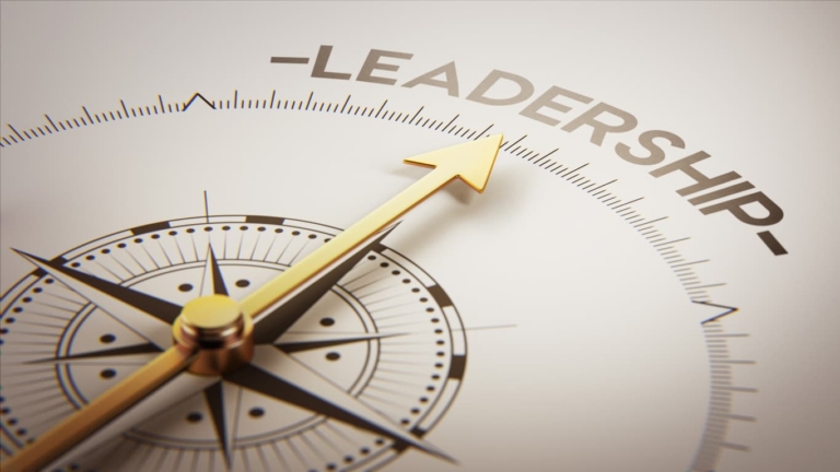 A compass needle points to the word “leadership,” illustrating a common self-assessment approach for leaders